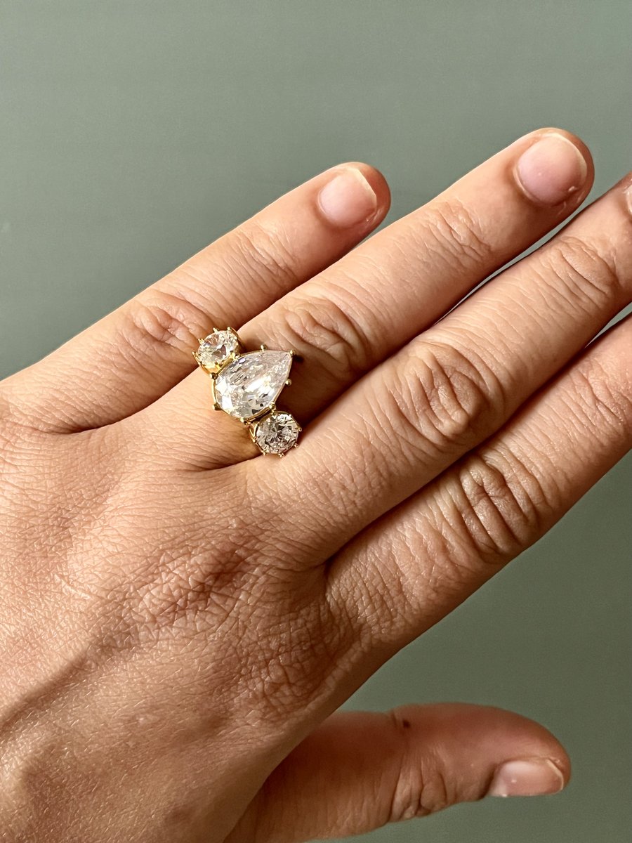 Teardrop and Round Zircon Ring